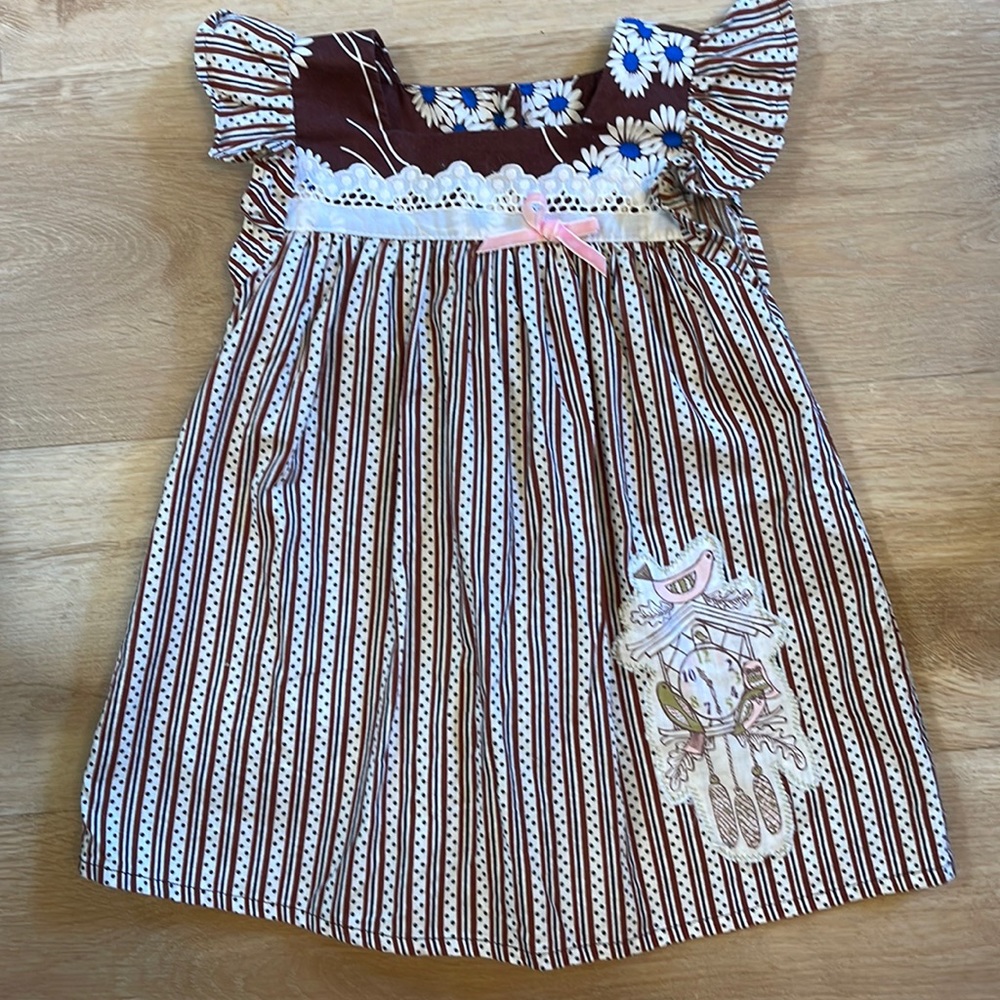 Super Boho mixed print long dress with bird patch on skirt. Super cute fabric!